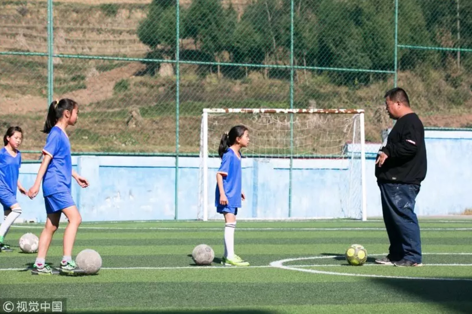 A poet and his girls football team 