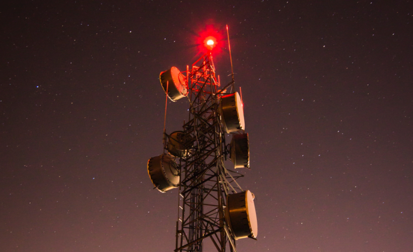 5G tower from China on the Digital Silk Road glows ominously red