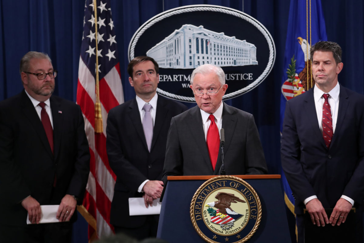 U.S. Department of Justice team including Jeff Sessions hold a press briefing in 2018 to announce a new initiative targeting scientists and researchers with ties to China