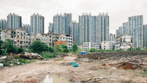 Photo of Wuhan apartment complex construction site with high-rises in the background