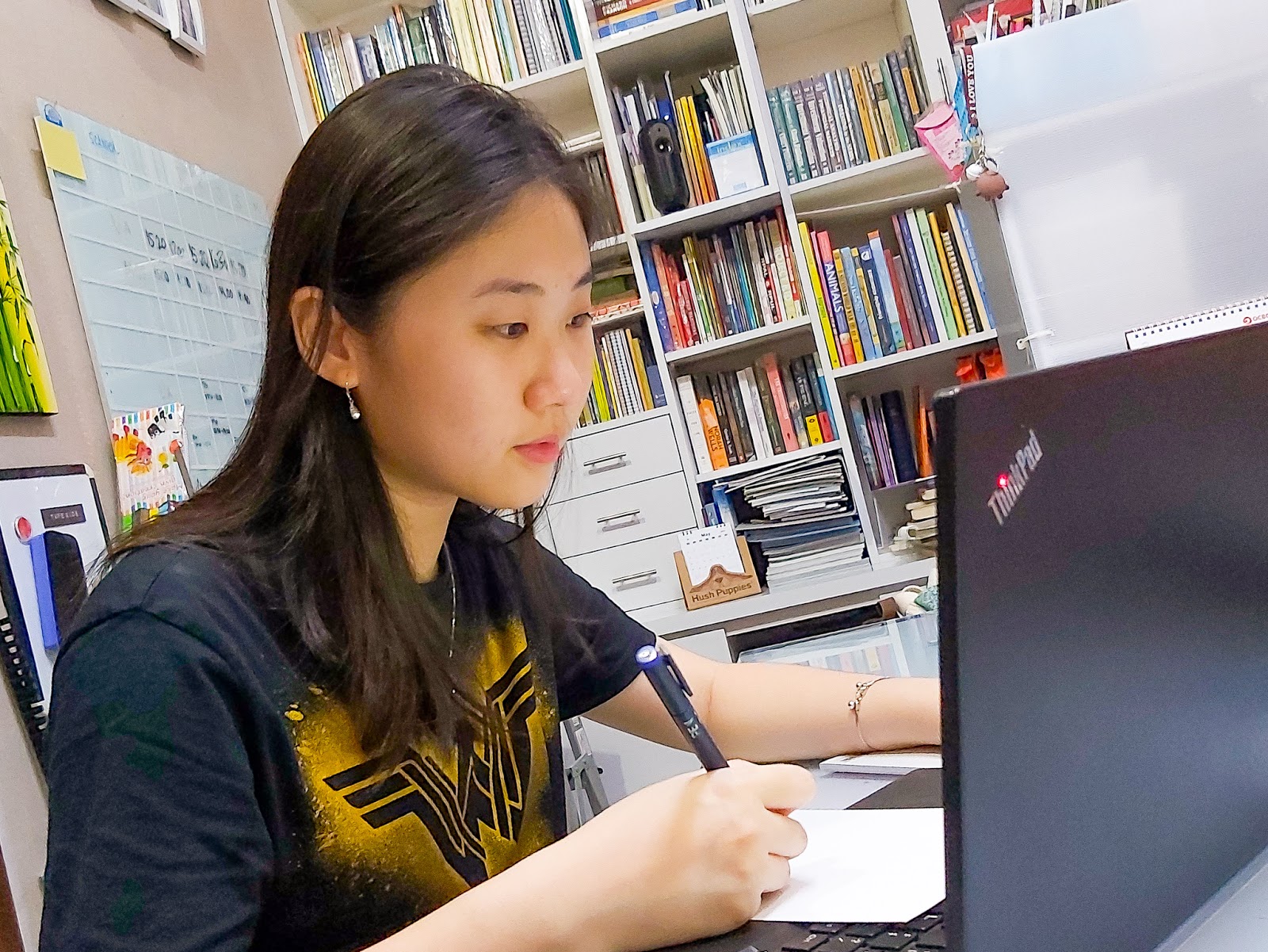 Vionna Fiducia, a student at Xi’an Jiaotong-Liverpool University, studying at her home in Indonesia