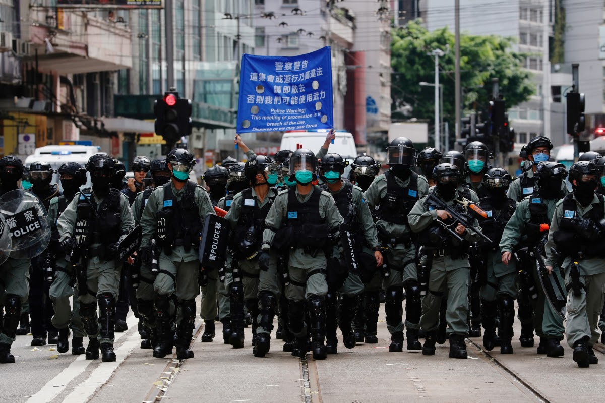 hong-kong-riot-police-marching-july-1