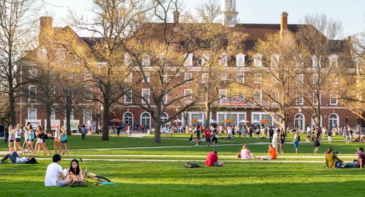 Students on the Quad lawn of University of Illinois college campus in Urbana-Champaign