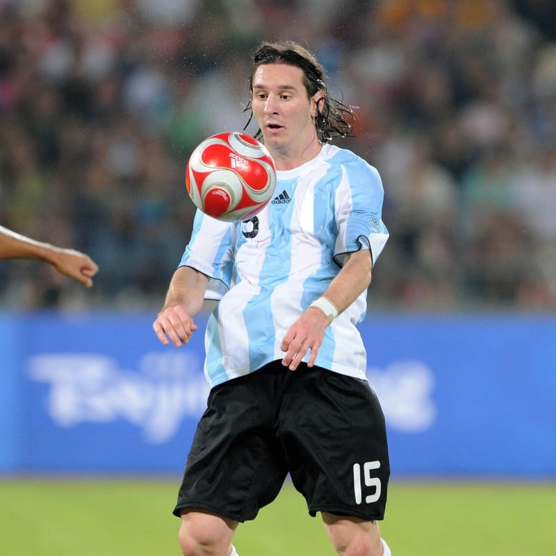 Messi playing in the Bird's Nest Stadium during the finals of the 2008 Beijing Olympics.