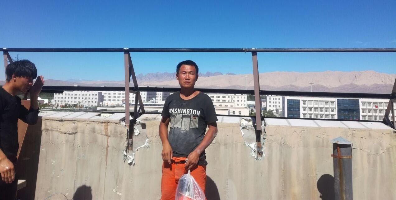 Kong Yuanfeng at a prison and detention center complex near Kashgar
