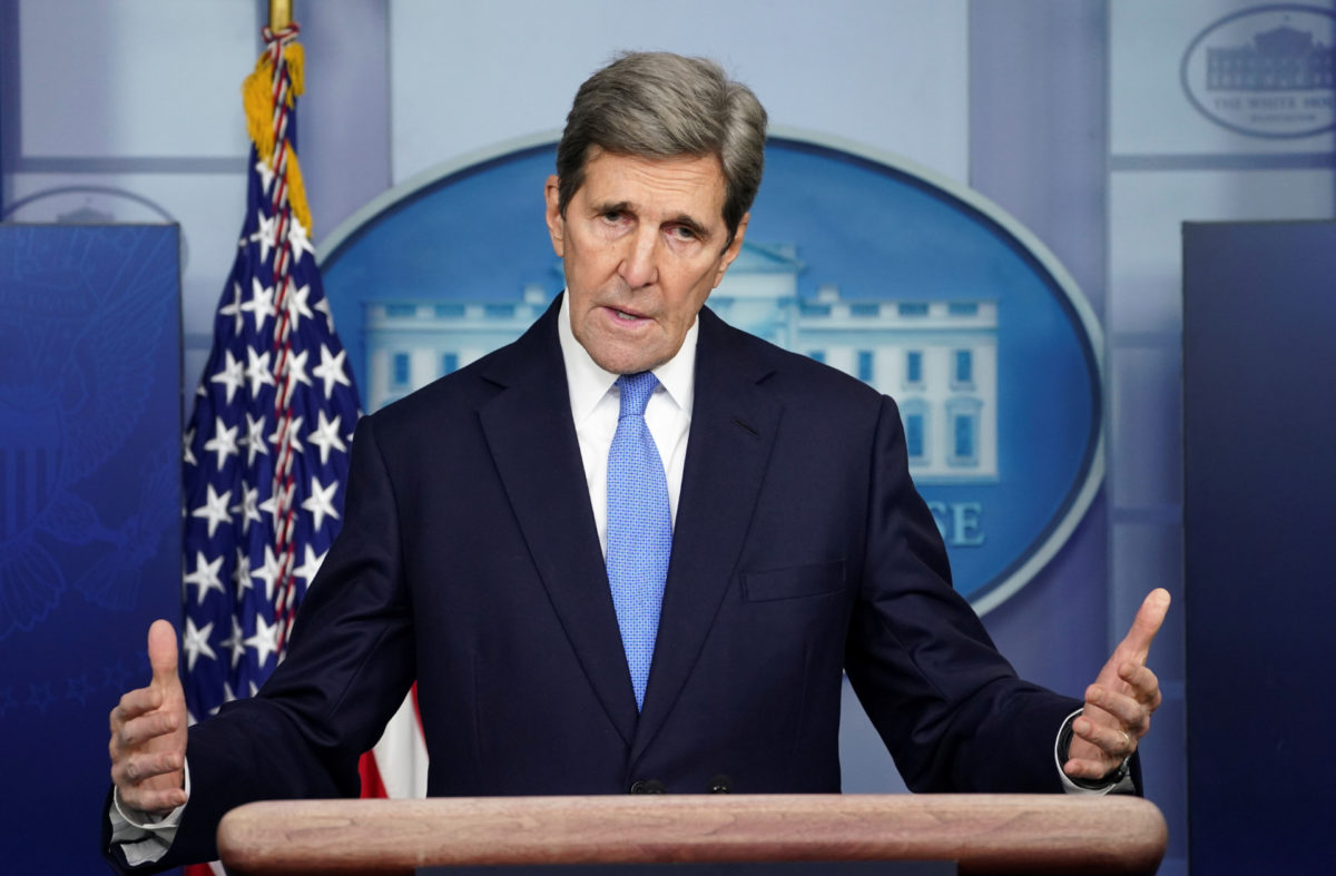 John Kerry giving a briefing as climate envoy for the Biden administration