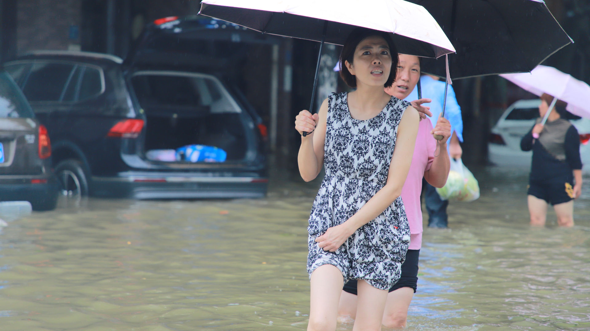 People try to commute in Zhengzhou this morning after yesterday’s deluge