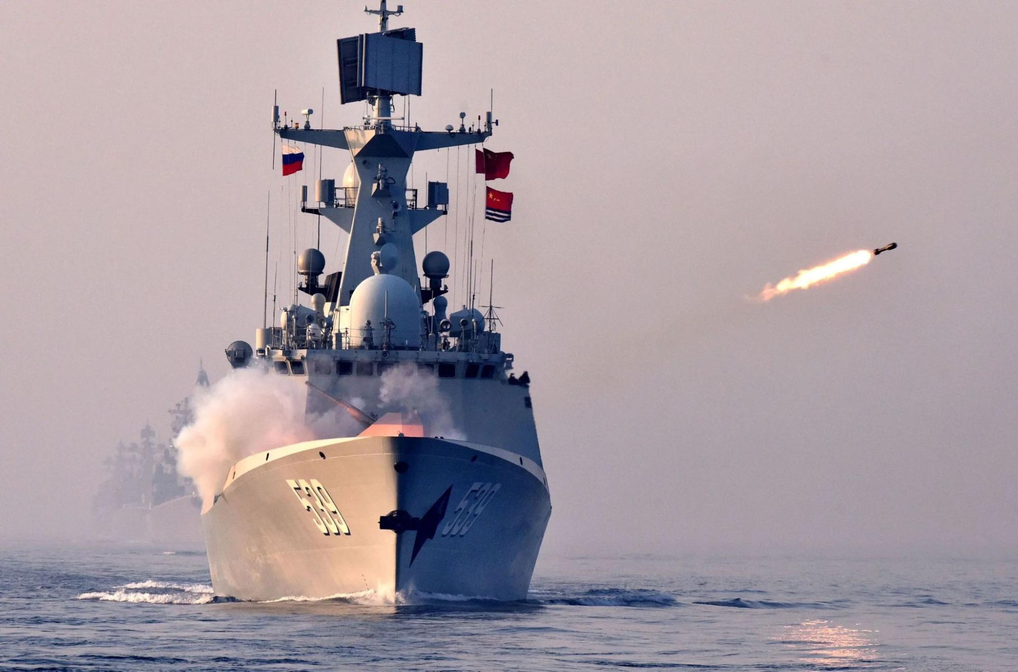 chinese navy ship with russia flag